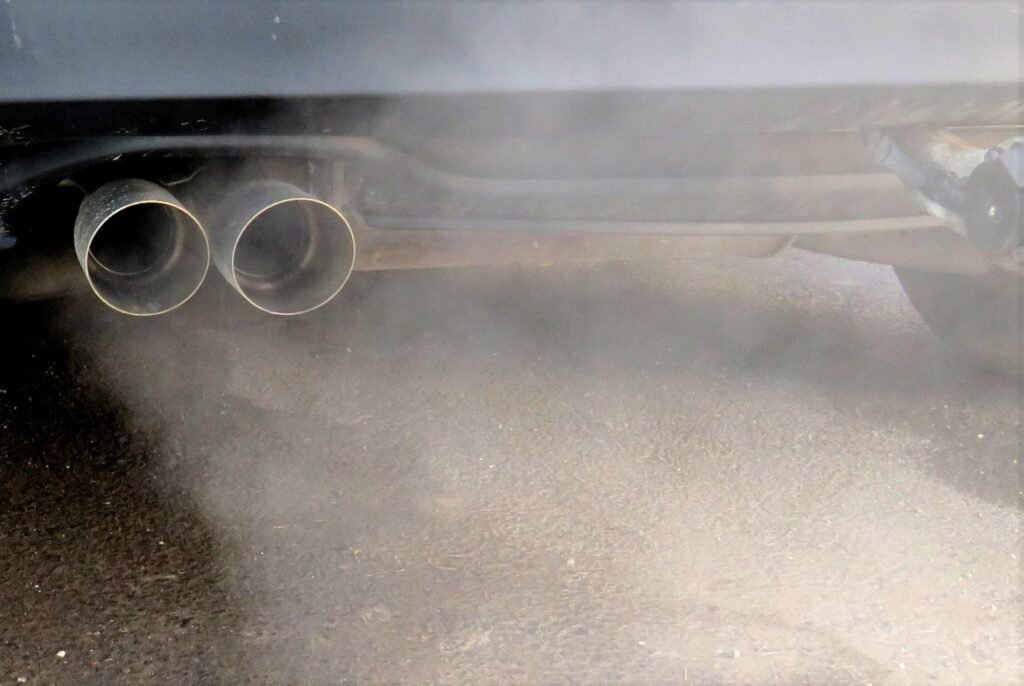 Closeup shot of an auto that exhausts smoke